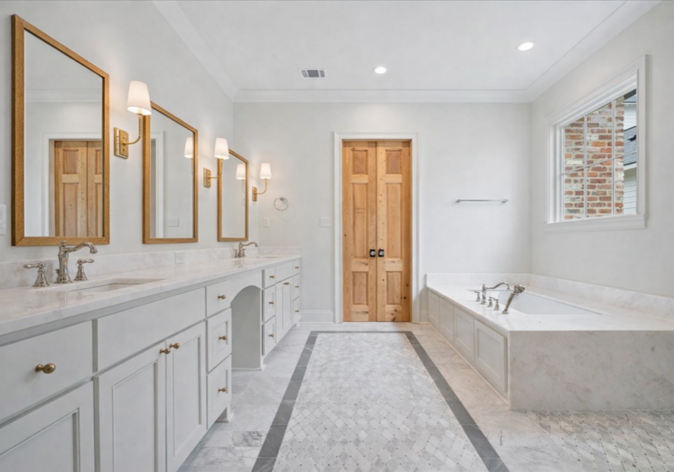 Spacious master bathroom with marble details (2)